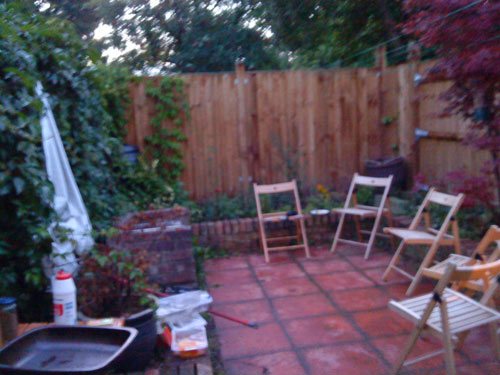 Set-up in back garden of Victorian cottage London for barbecue Set-up in back garden of Victorian cottage London for barbecue