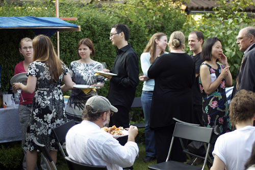 Queuing for Egyptian dinner in the garden of Monument House Utrecht