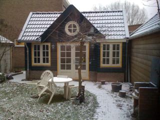 Garden house in winter, good enough to eat